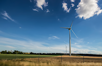 Afbeelding windmolens tegen blauwe lucht