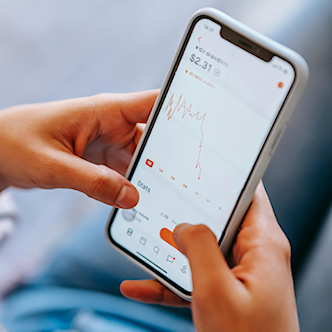 smartphone-met-grafiek-332x332